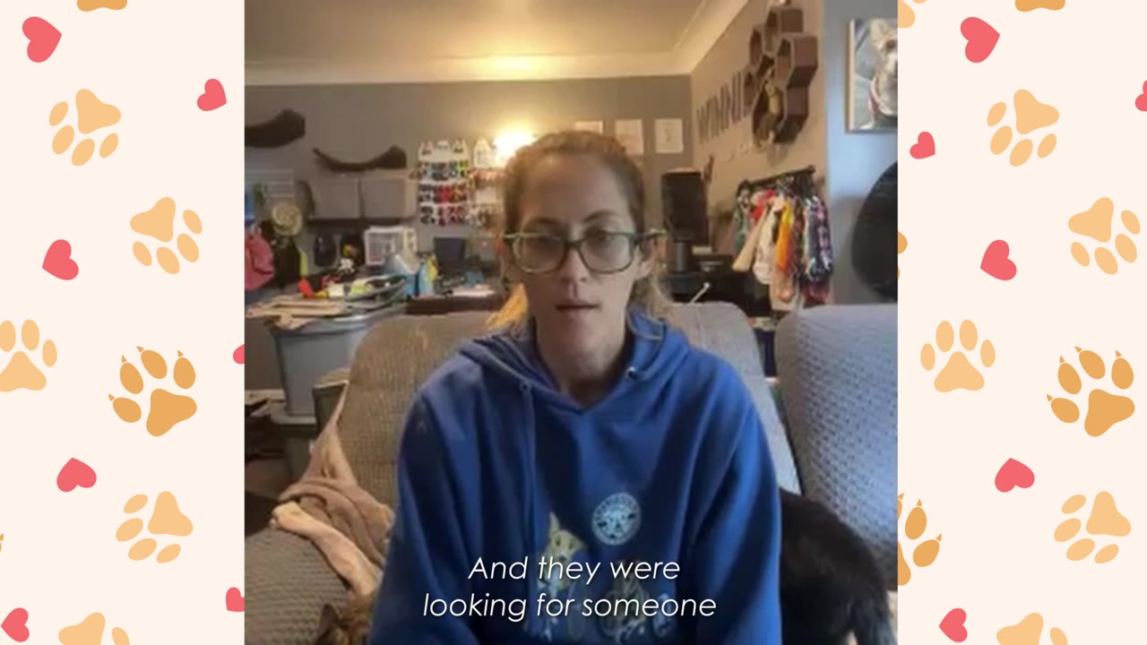 A woman wearing glasses and a blue hoodie sits on a couch, speaking about the search for help.