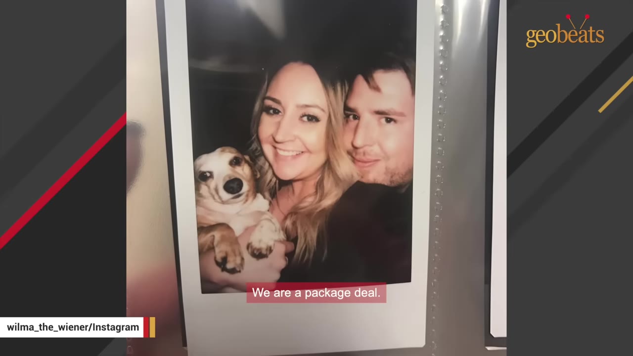 A polaroid photo showing a smiling woman holding a small brown and white dog, with a man standing close behind her.