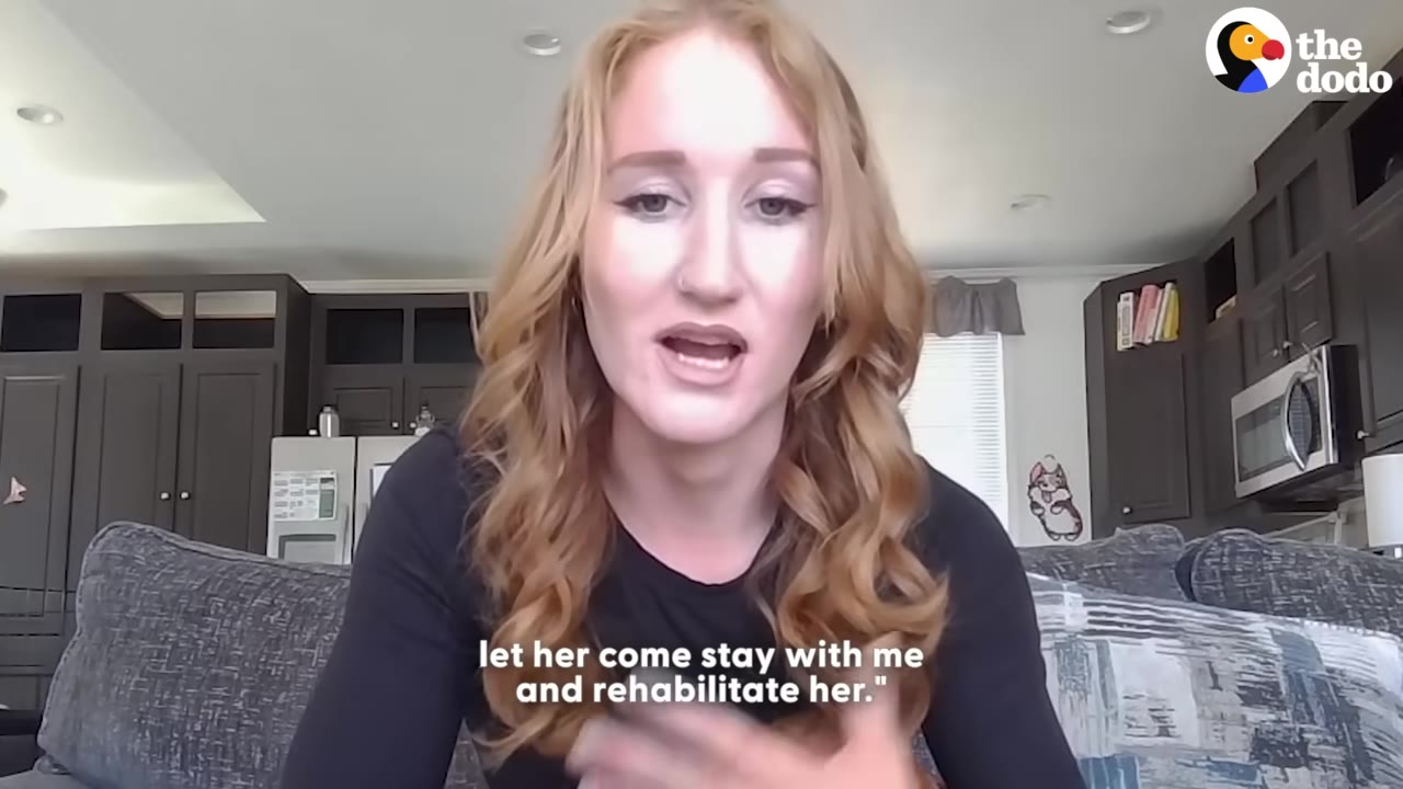 A woman with long strawberry blonde hair speaks to the camera, with a subtitle that reads, 'let her come stay with me and rehabilitate her.'