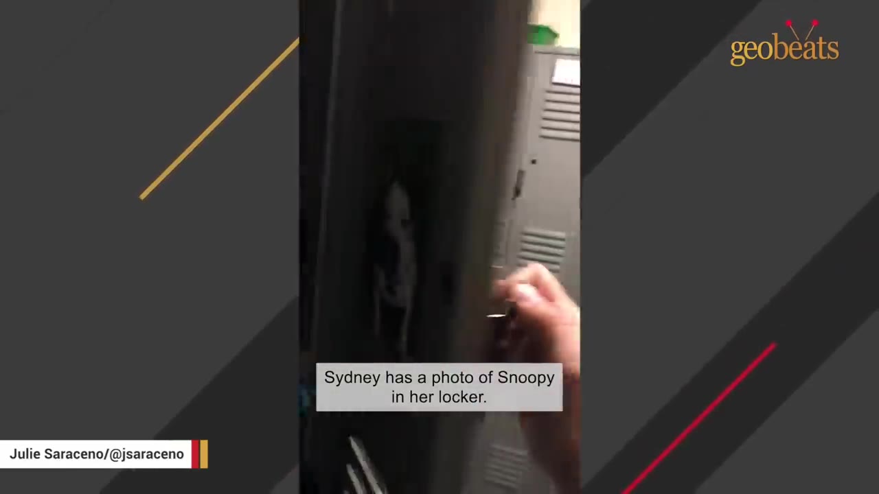 A hand opening a metal locker to reveal a black and white photo of Snoopy the dog taped inside, with text reading 'Sydney has a photo of Snoopy in her locker.'