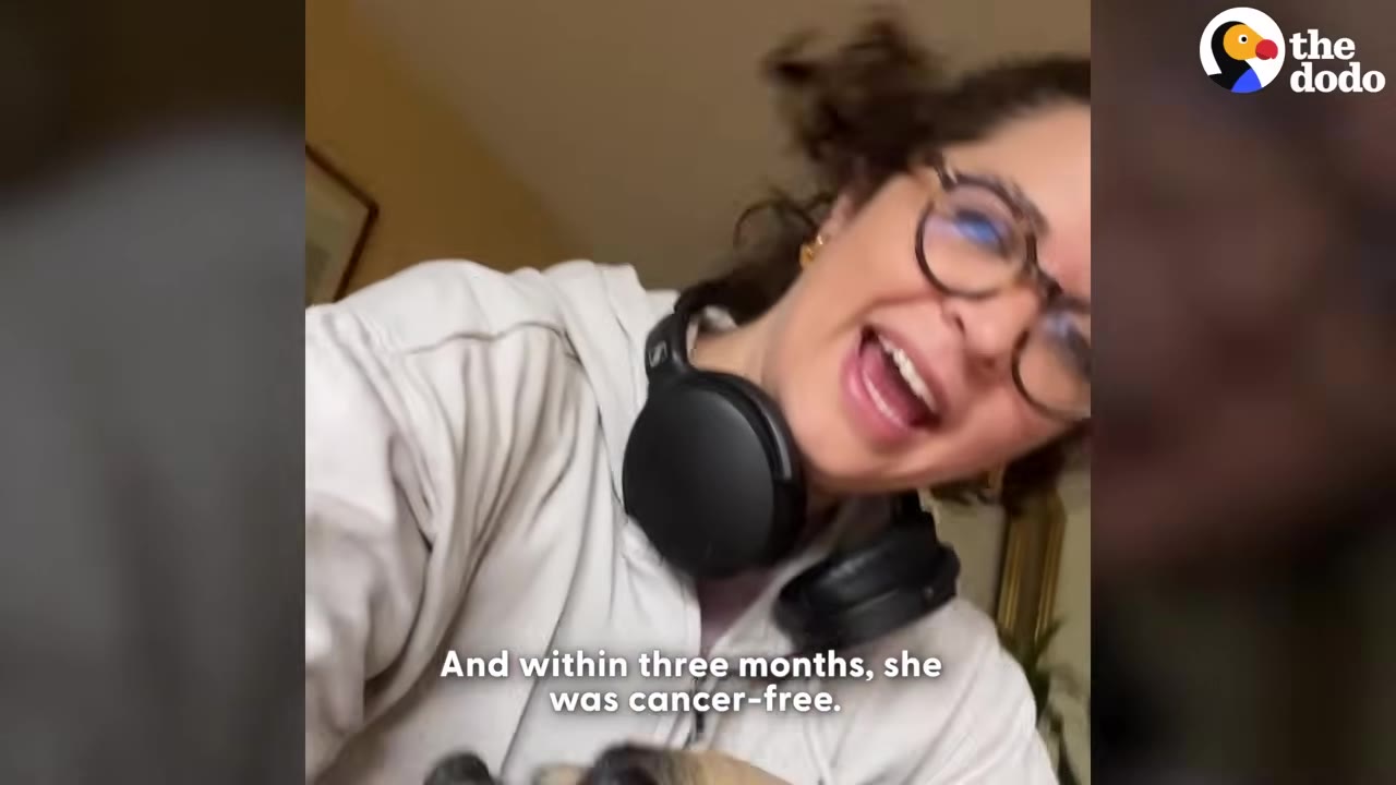 A woman with glasses and headphones smiles joyfully, with text reading 'And within three months, she was cancer-free.'