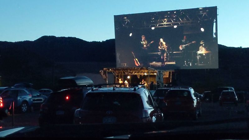 Watch a movie at Holiday Twin Drive-In