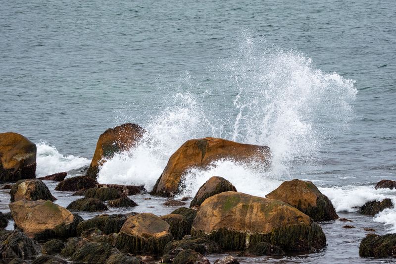 Breaking Waves Can Shove A Swimmer Toward Stone