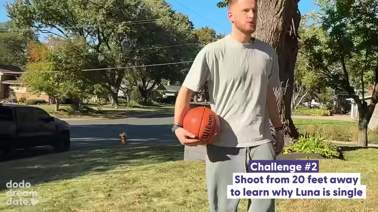Donte walking on a grassy lawn holding a basketball under his arm, with text overlay reading 'Challenge #2 Shoot from 20 feet away to learn why Luna is single'.