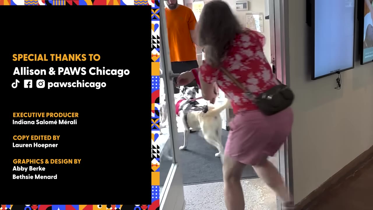 A woman in a red floral shirt opens a glass door to greet a man in an orange shirt and a dog waiting outside.