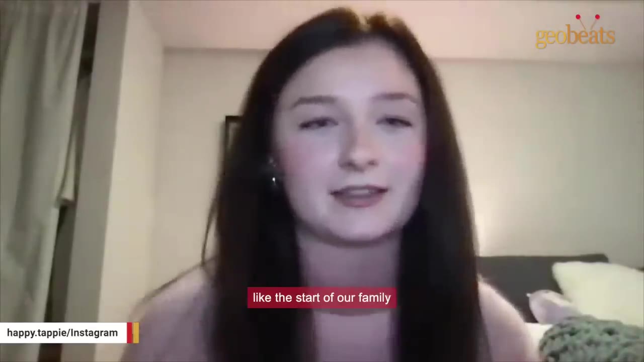 A young woman with dark hair speaks directly to the camera, with a subtitle reading 'like the start of our family'.