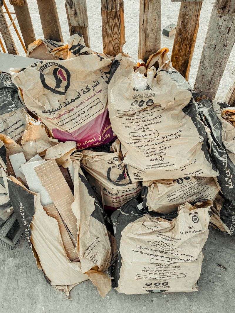 Fertilizer and Weed Control Products Sitting in Torn Bags