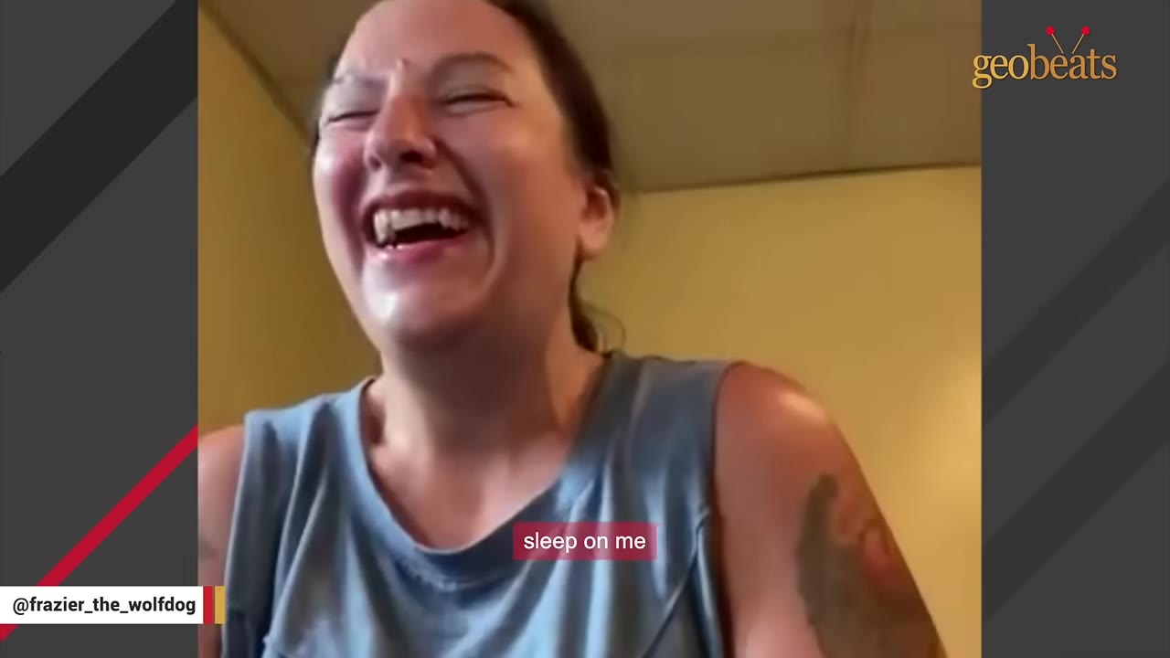 A close-up of a woman with a tattoo on her arm laughing joyfully, with a subtitle reading 'sleep on me' at the bottom.