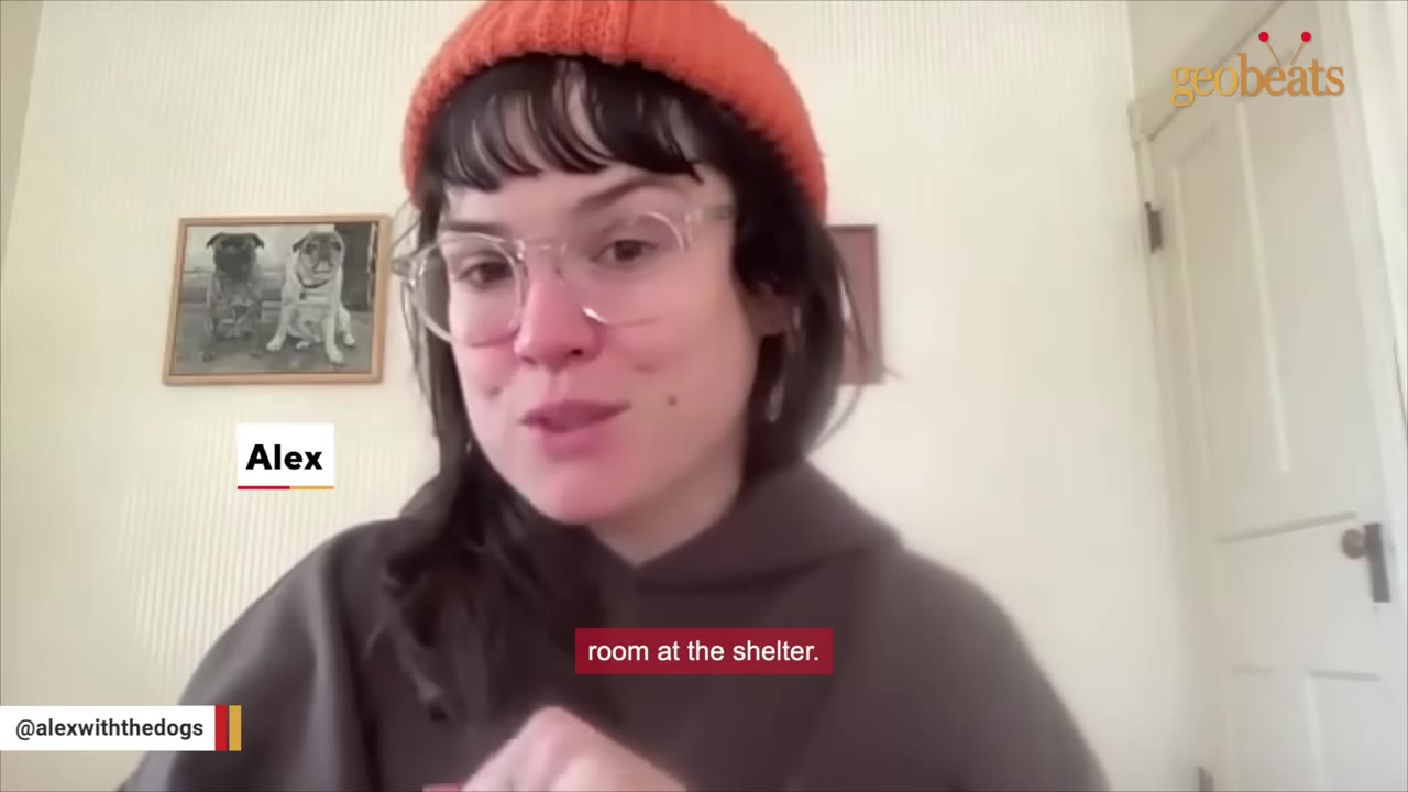 A woman named Alex wearing an orange beanie and glasses speaks to the camera, with a subtitle that reads 'room at the shelter.'