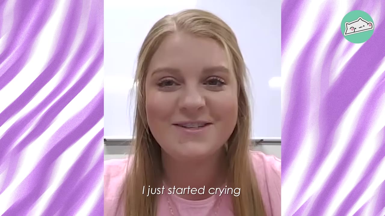 A close-up of a smiling blonde woman speaking, with the subtitle 'I just started crying' displayed at the bottom.