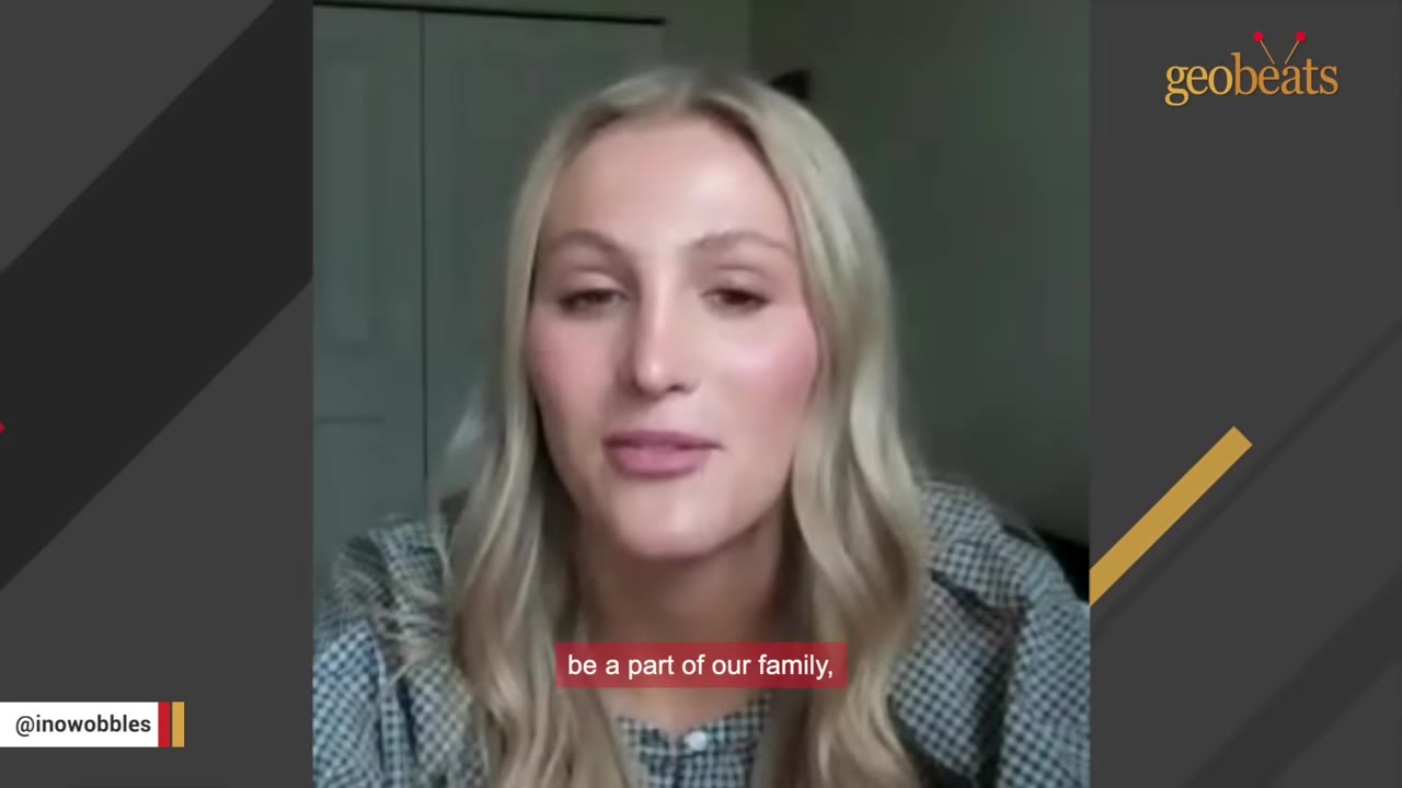 A close-up portrait of a blonde woman with long hair wearing a plaid shirt, speaking directly to the camera.