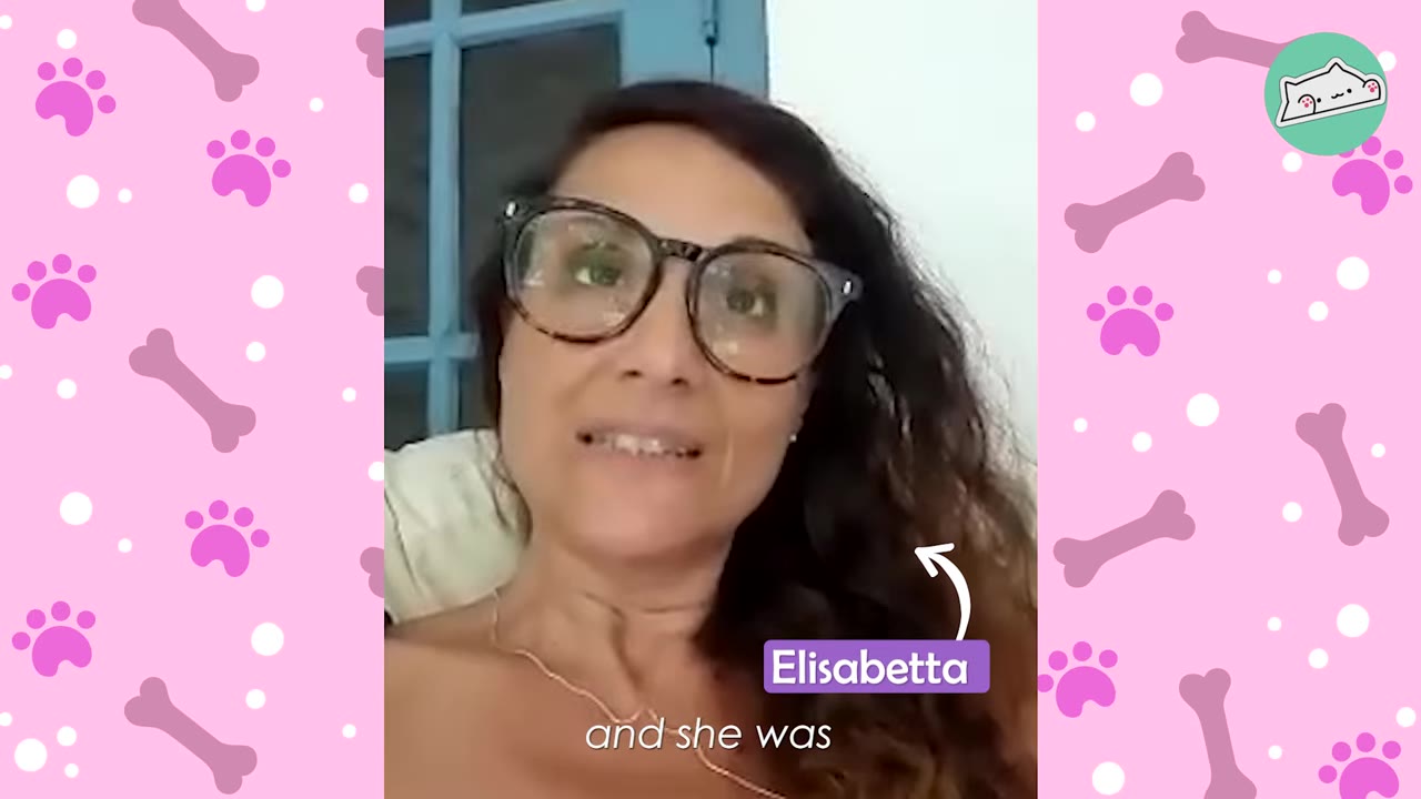 A woman with long dark hair and glasses, identified by a label as Elisabetta, speaking to the camera.