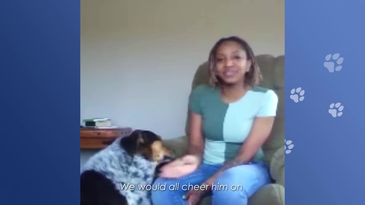 A woman sitting in an armchair next to a large, fluffy dog, with the caption 'We would all cheer him on' displayed at the bottom.