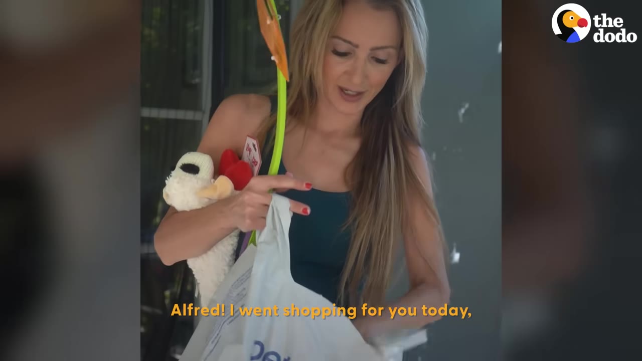 A woman with long blonde hair holding a white shopping bag and a stuffed toy under her arm.