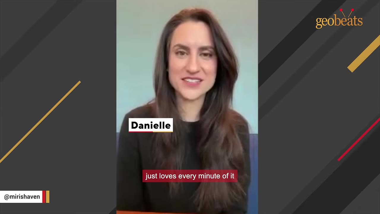 A woman named Danielle speaking directly to the camera with a caption that reads 'just loves every minute of it'.