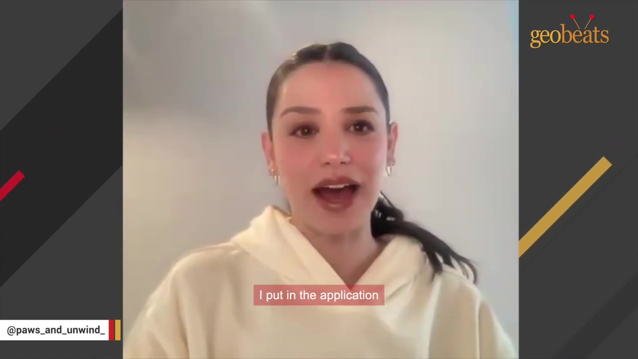 A woman with dark hair pulled back in a ponytail, wearing a cream-colored hoodie, speaks directly to the camera with a subtitle that reads 'I put in the application'.