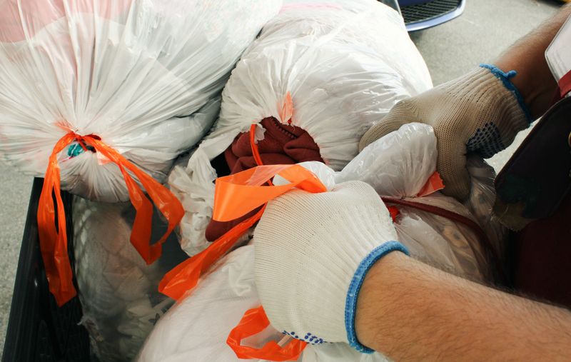 Pack Waste Bags and Cleaning Supplies