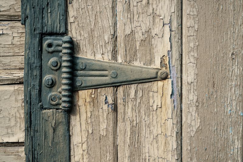 Check Hinges for Rust and Loose Screws