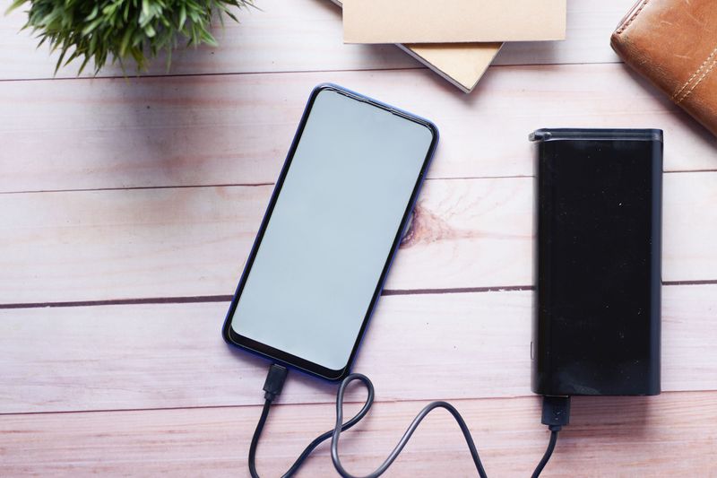 Charged Phone, Power Bank, and Car Charger