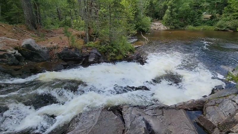 Twelve Foot Falls: A Compact Waterfall Base Near Dunbar