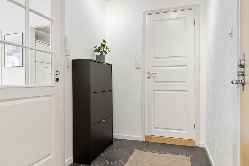 Swap the Open Rack for a Slim Shoe Cabinet