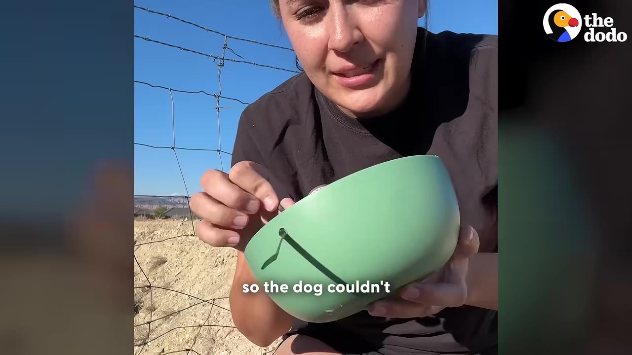 A close-up of a woman holding a green plastic bowl with a hole drilled in it for a zip-tie, preparing to secure it.
